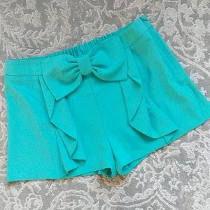 Turquoise shorts with bow & ruffle detail